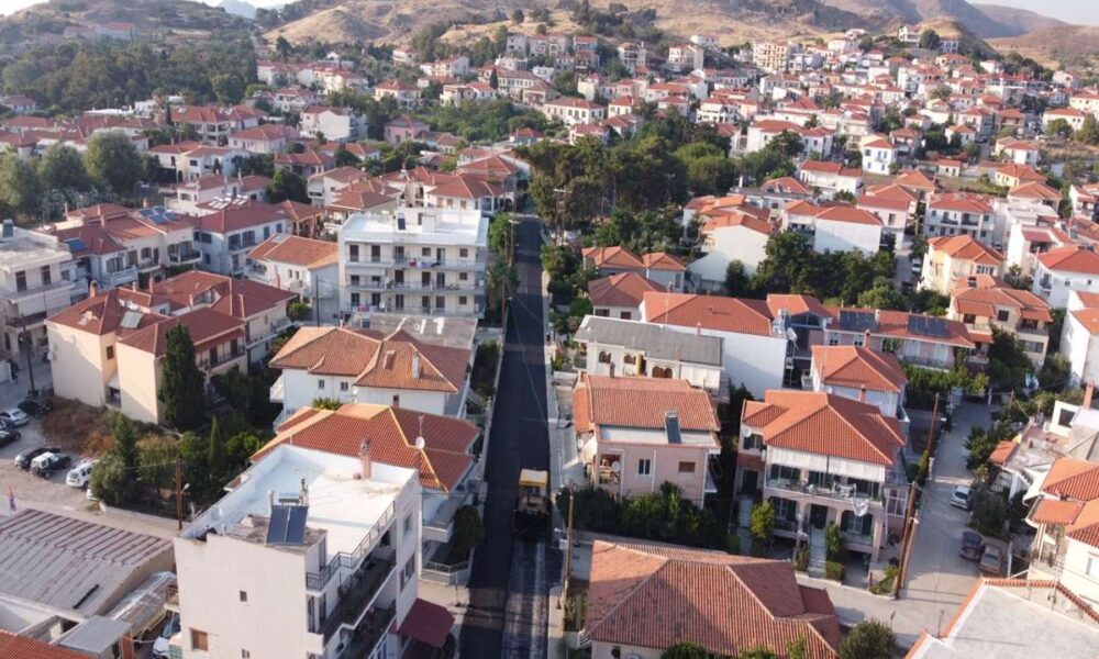 a city with many buildings and trees
