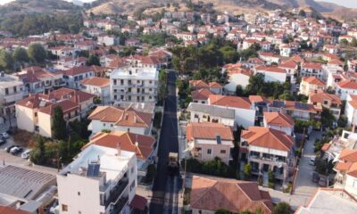 a city with many buildings and trees