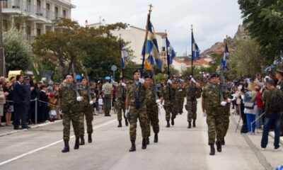a group of soldiers marching in a parade