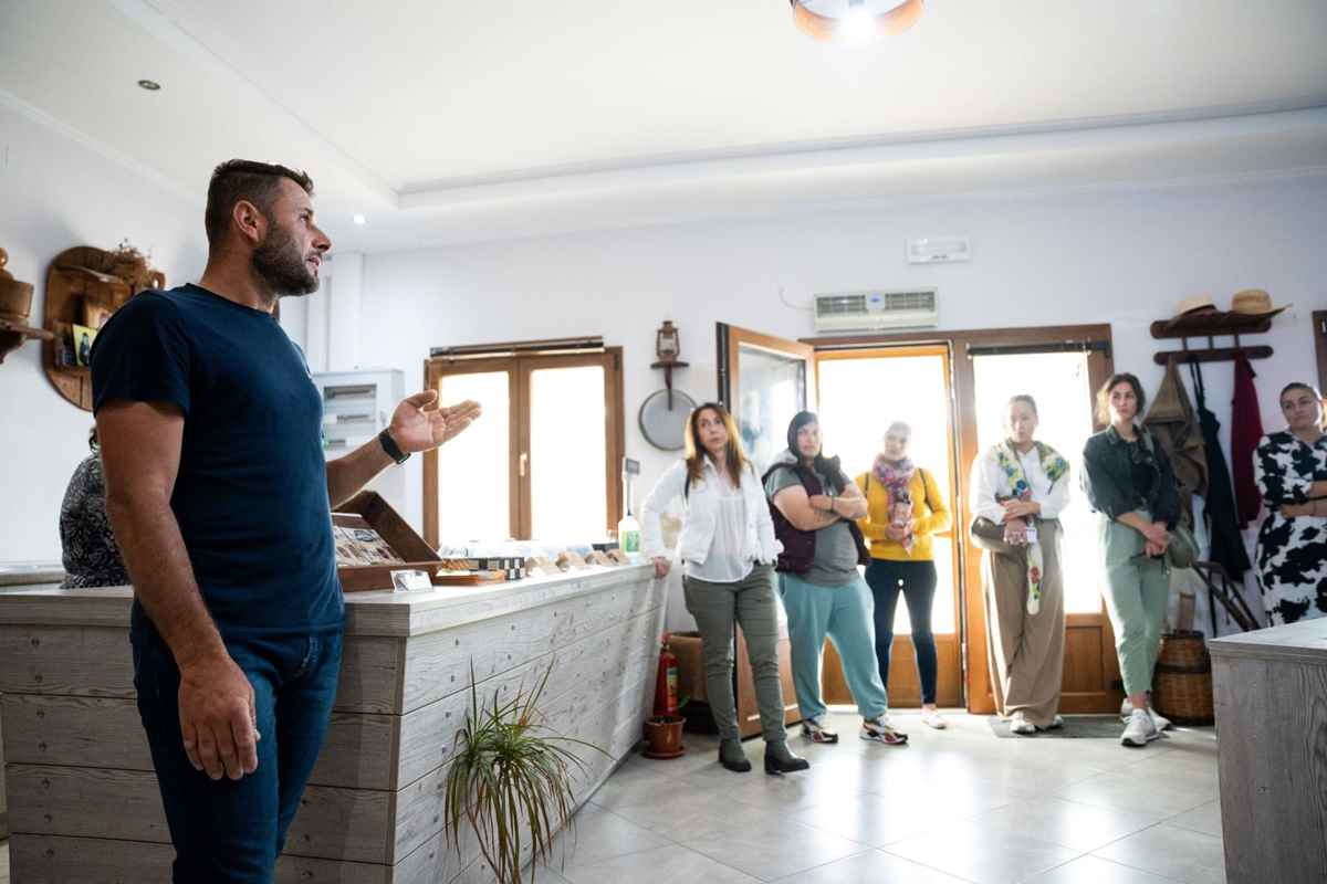 a group of people standing in a room