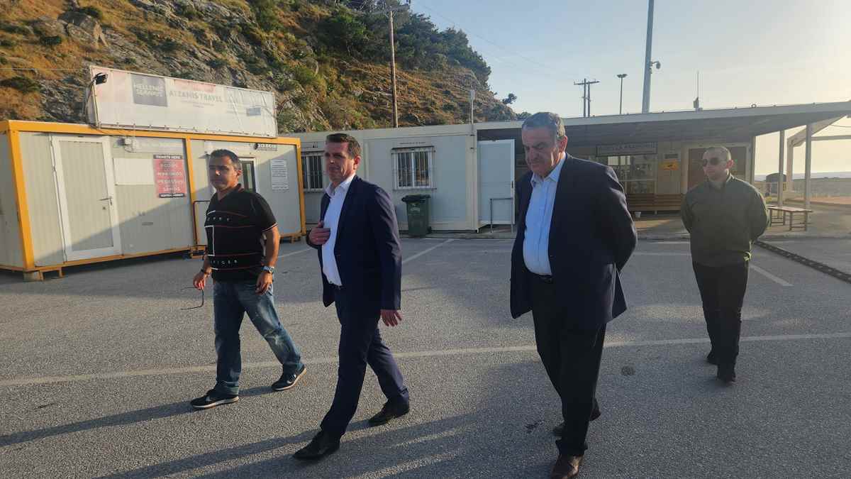 a group of men walking in a parking lot