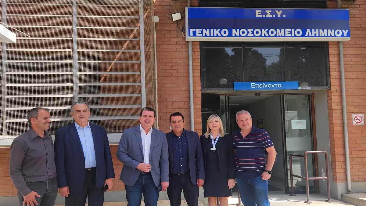 a group of people standing in front of a building