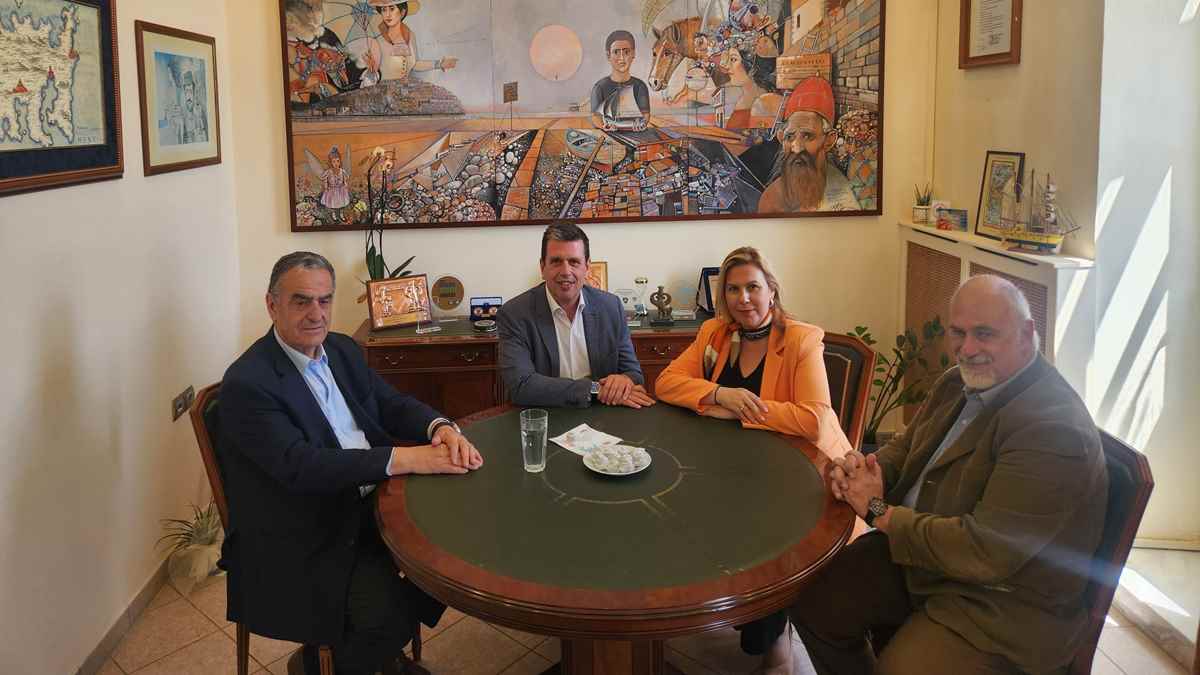 a group of people sitting at a table