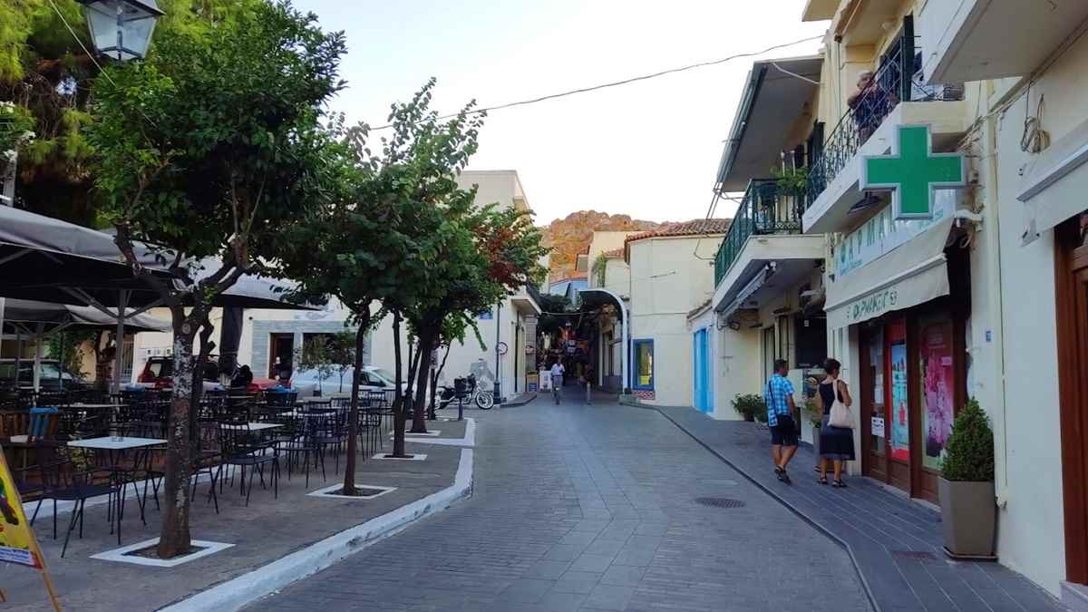 a street with buildings and trees