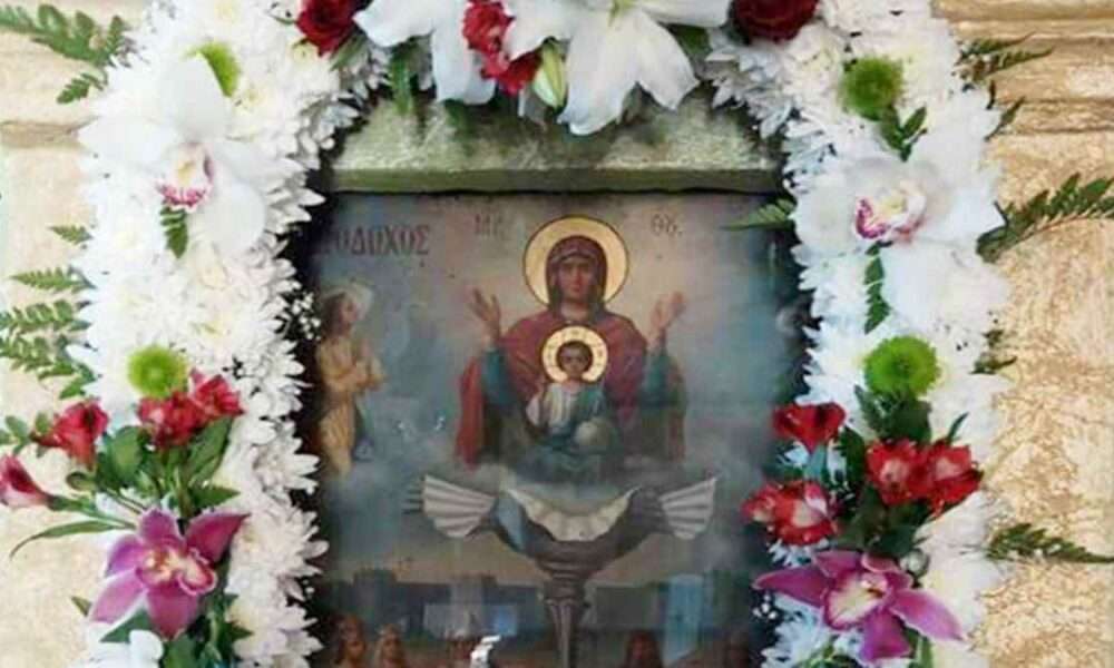 a picture of a person holding a child