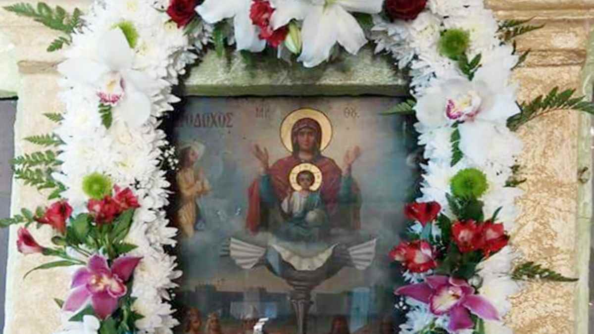 a picture of a person holding a child