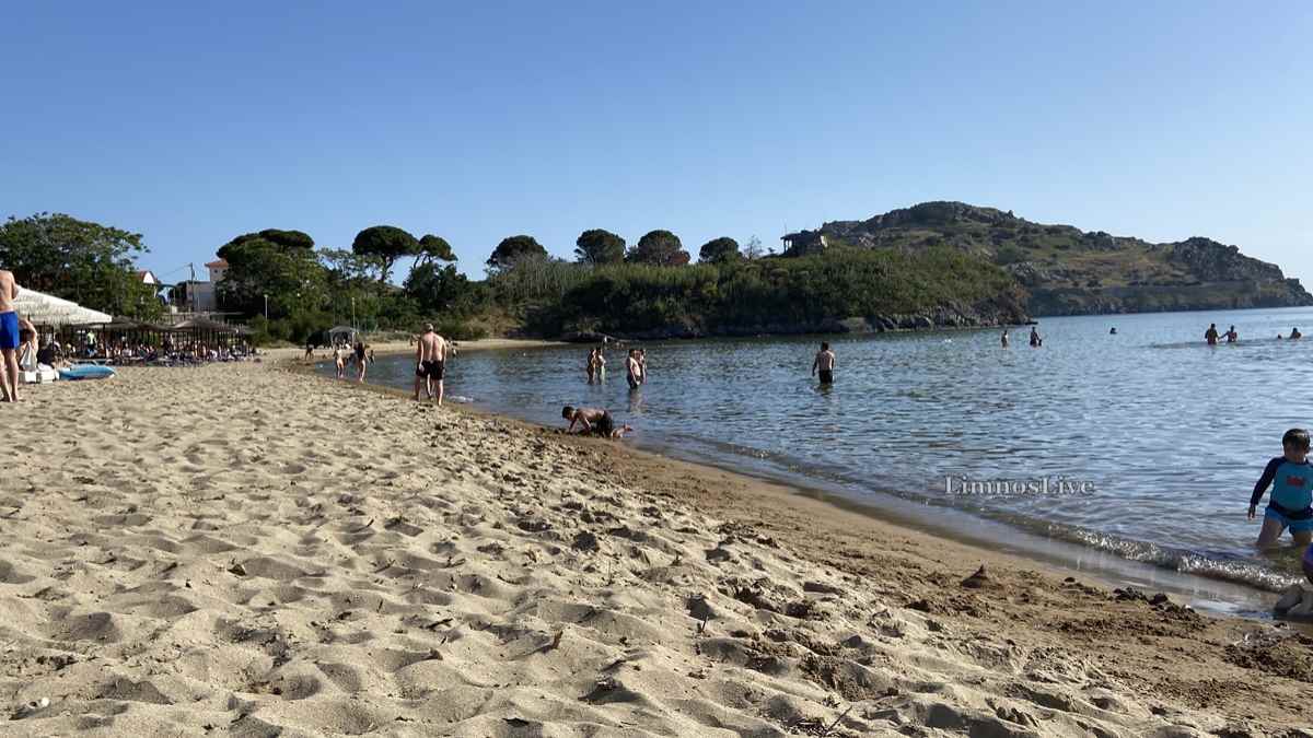 a group of people on a beach
