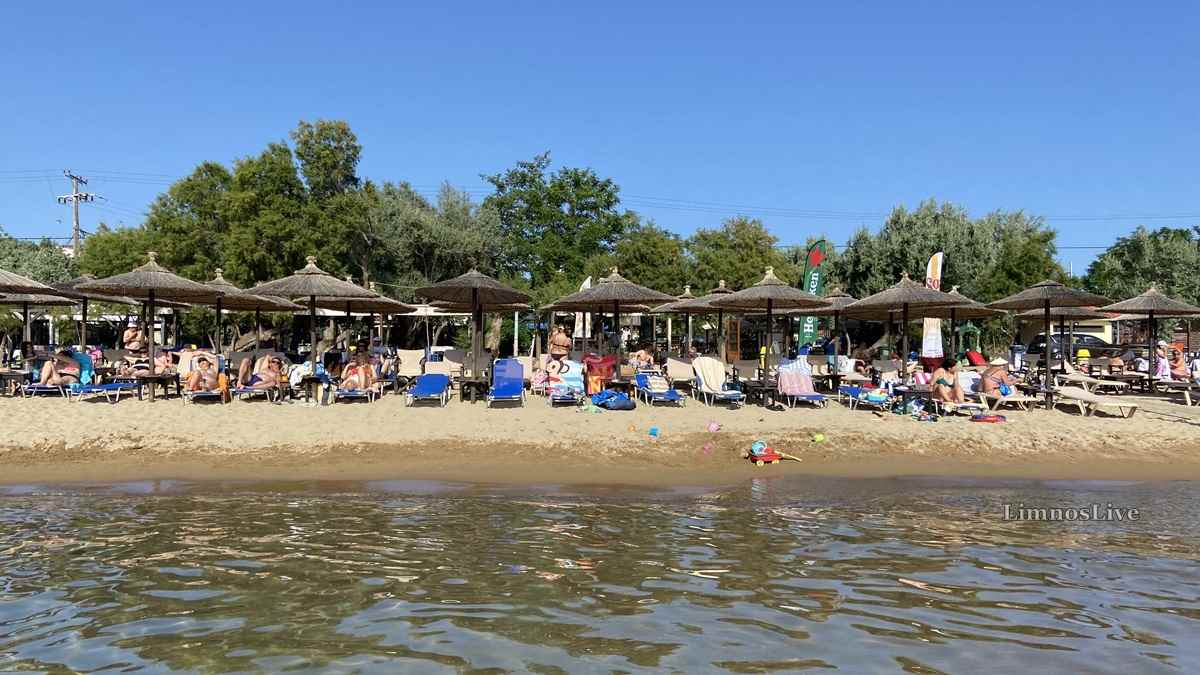 a group of people on a beach