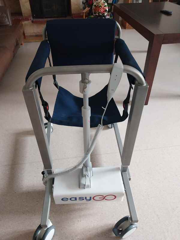 a chair with a device attached to it