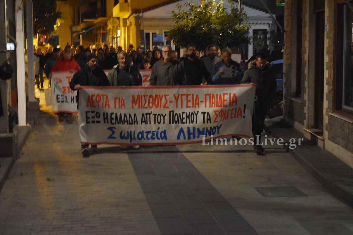 a group of people holding a banner