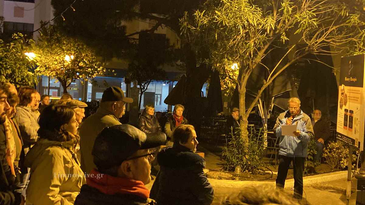 a group of people outside at night