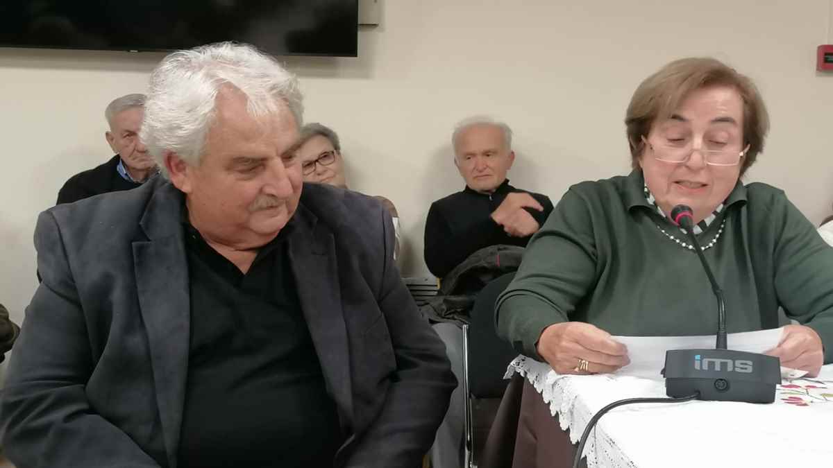 a group of people sitting at tables