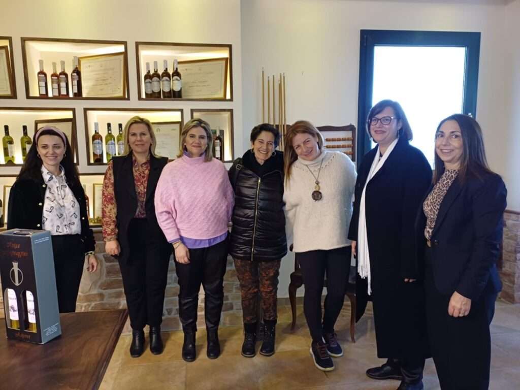 a group of women posing for a photo