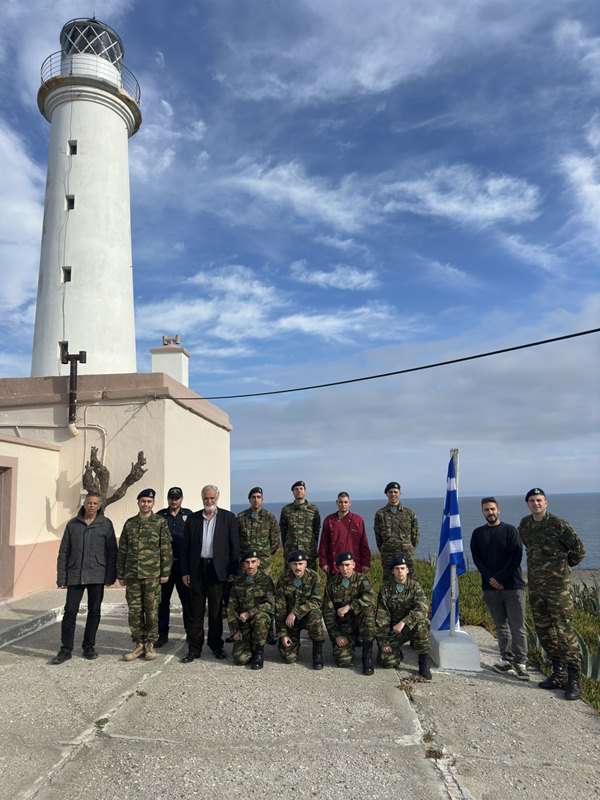 a group of people posing for a photo