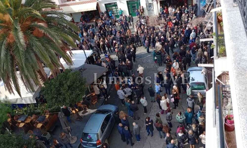 a group of people standing on a street