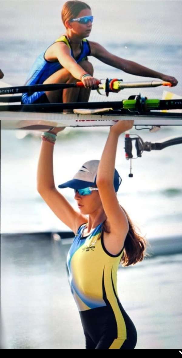 a woman holding a boat