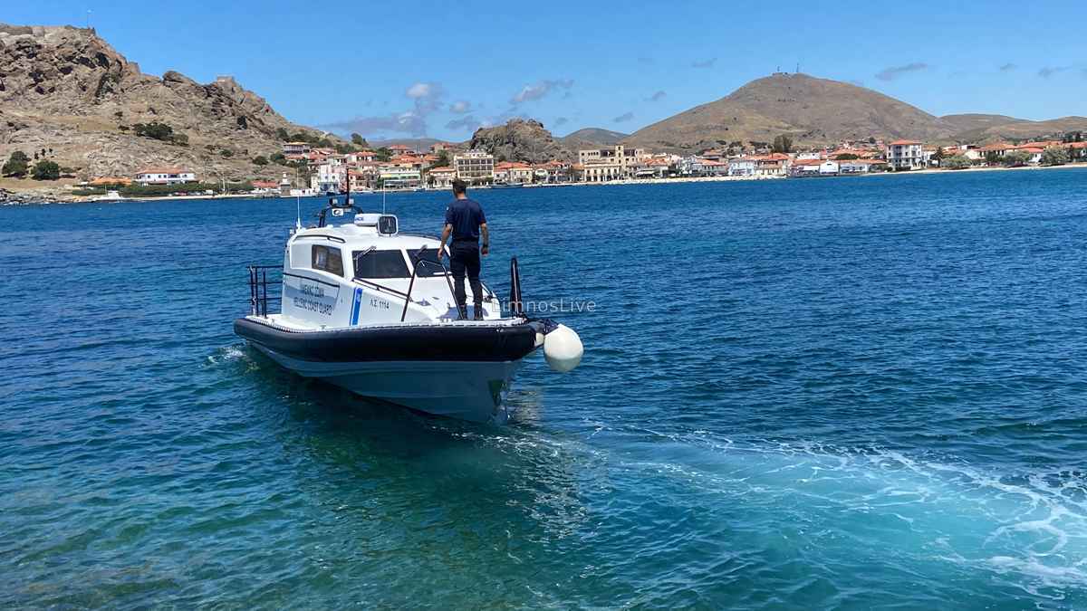 a man standing on a boat in the water